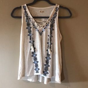 Tank top with blue embroidery